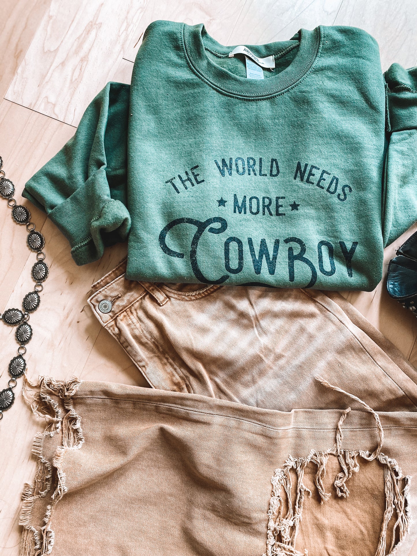 The World Needs More Cowboy Sweatshirt